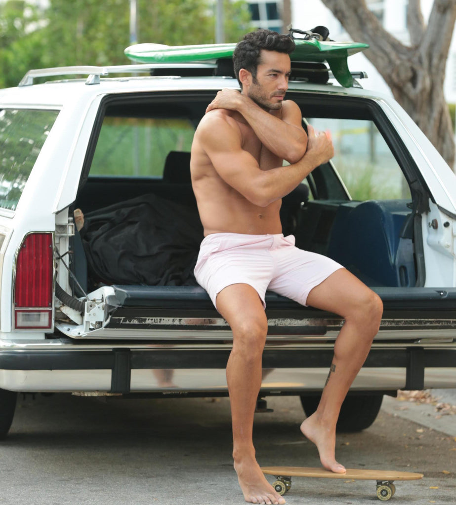 AARON DIAZ, STAR OF QUANTICO SPOTTED IN BOTO SWIM SHORTS